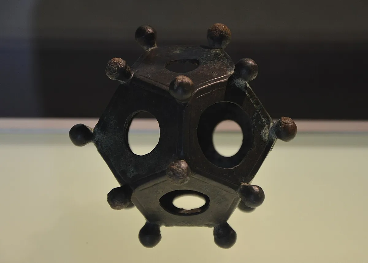 Roman dodecahedron in a display case at the Gallo-Roman Museum, Tongeren